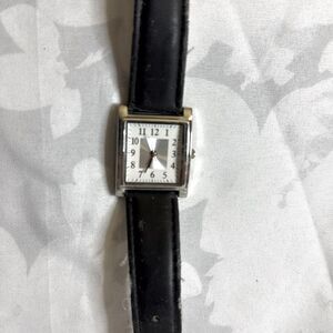 Vintage classic square silver and white face watch. New battery, keeps good time